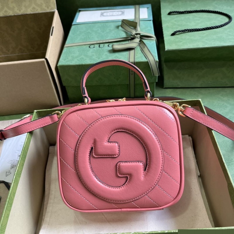 G*u*i top handle bags